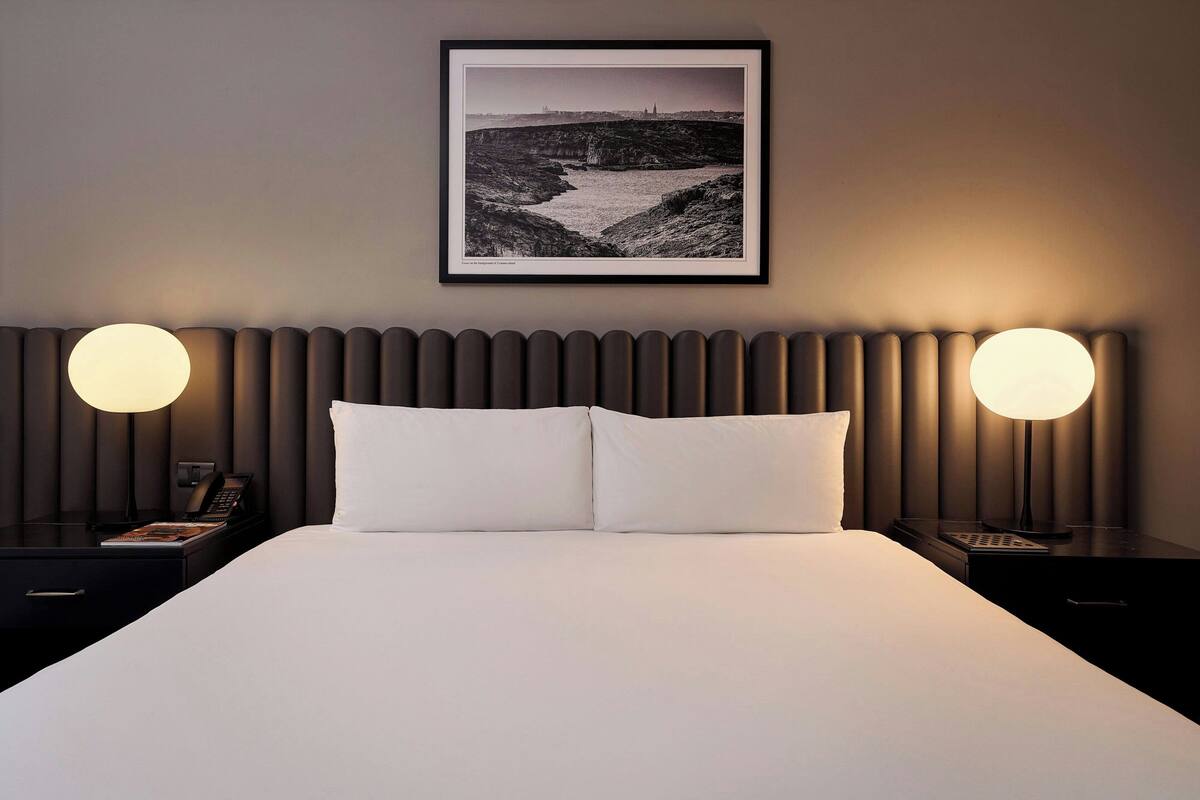 Premium bedding, down duvets, minibar, in-room safe