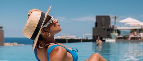 Indoor pool, seasonal outdoor pool, cabanas (surcharge), pool umbrellas