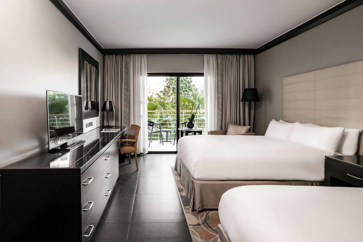 Premium bedding, down duvets, minibar, in-room safe