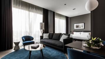 Premium bedding, down comforters, minibar, in-room safe