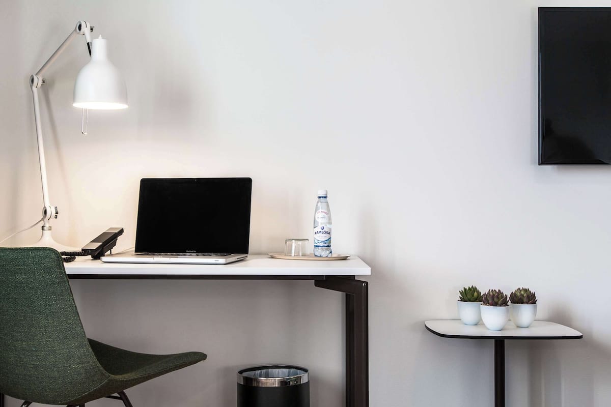 1 bedroom, premium bedding, laptop workspace, blackout curtains