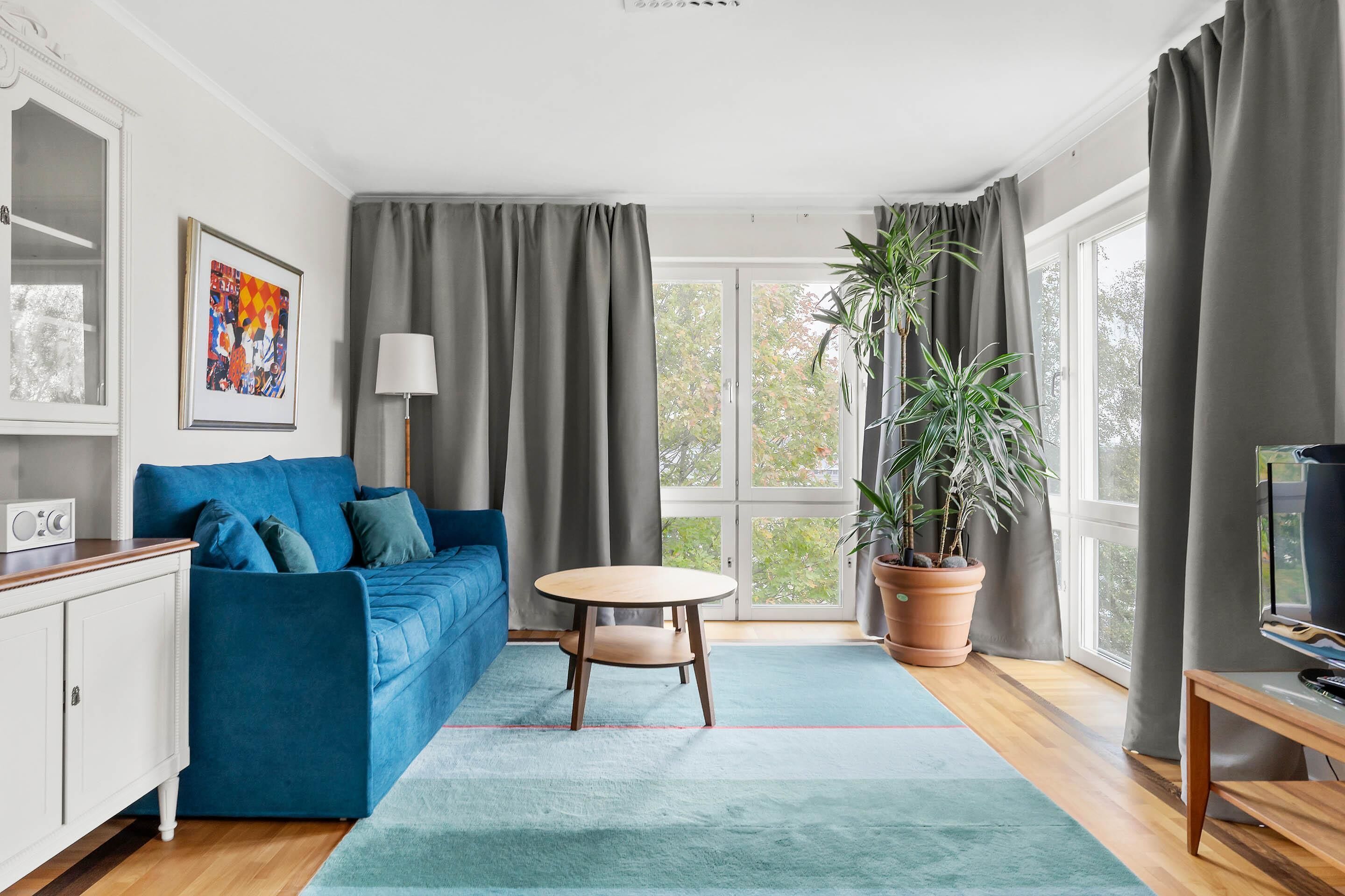 Premium bedding, laptop workspace, blackout drapes, soundproofing