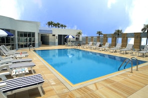 Seasonal outdoor pool, open 8:00 AM to 6:00 PM, sun loungers