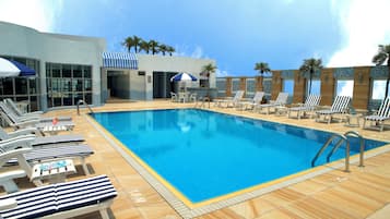 Seasonal outdoor pool, open 8:00 AM to 6:00 PM, sun loungers