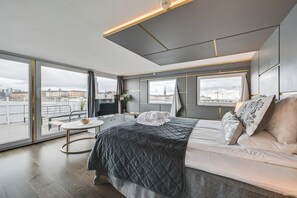 Suite estándar, 1 cama de matrimonio, vistas al mar, mirando al mar | Caja fuerte, wifi gratis, ropa de cama