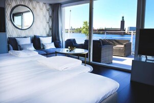 Suite estándar, 1 cama de matrimonio, vistas al mar, mirando al mar | Caja fuerte, wifi gratis, ropa de cama