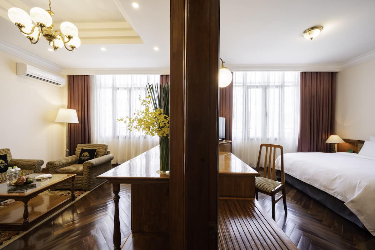 Century Suite | Living area | 42-inch TV with satellite channels