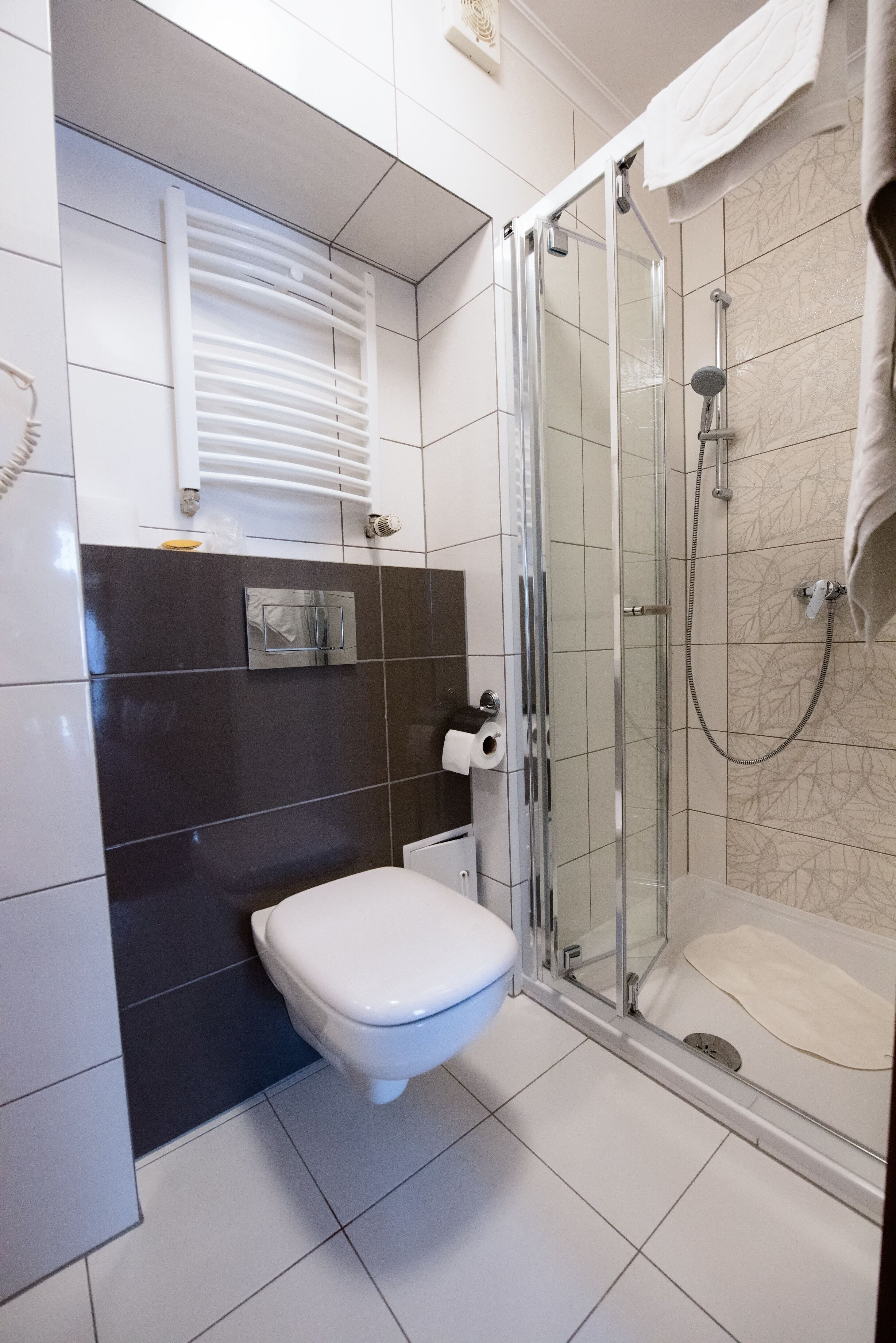 single room | bathroom | shower, hair dryer, towels, soap