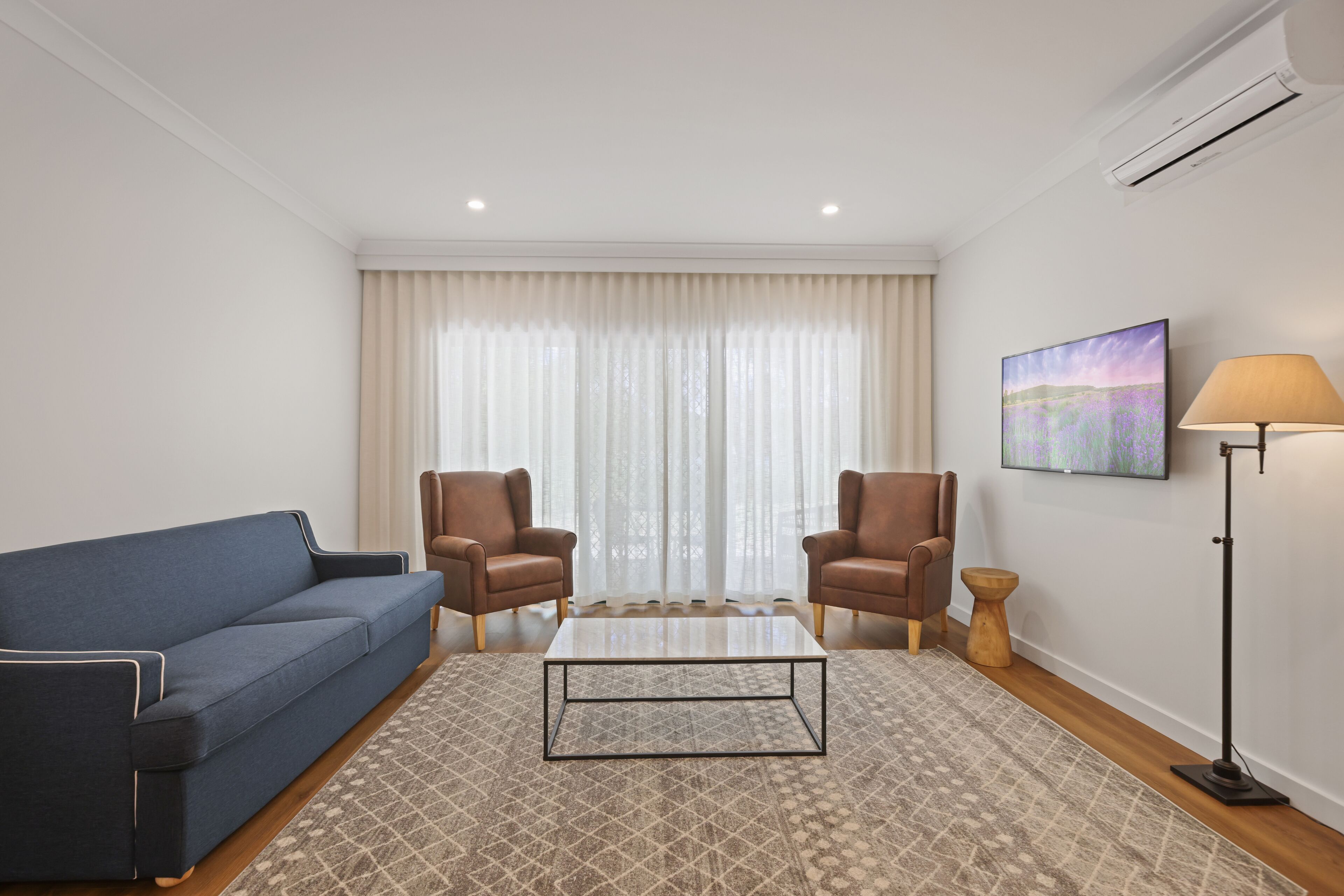 two bedroom apartment | living area | 50-inch flat-screen tv with digital channels, tv