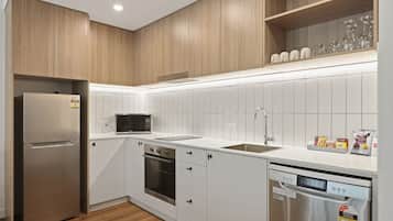 Two Bedroom Apartment | Living area | 50-inch flat-screen TV with digital channels, TV