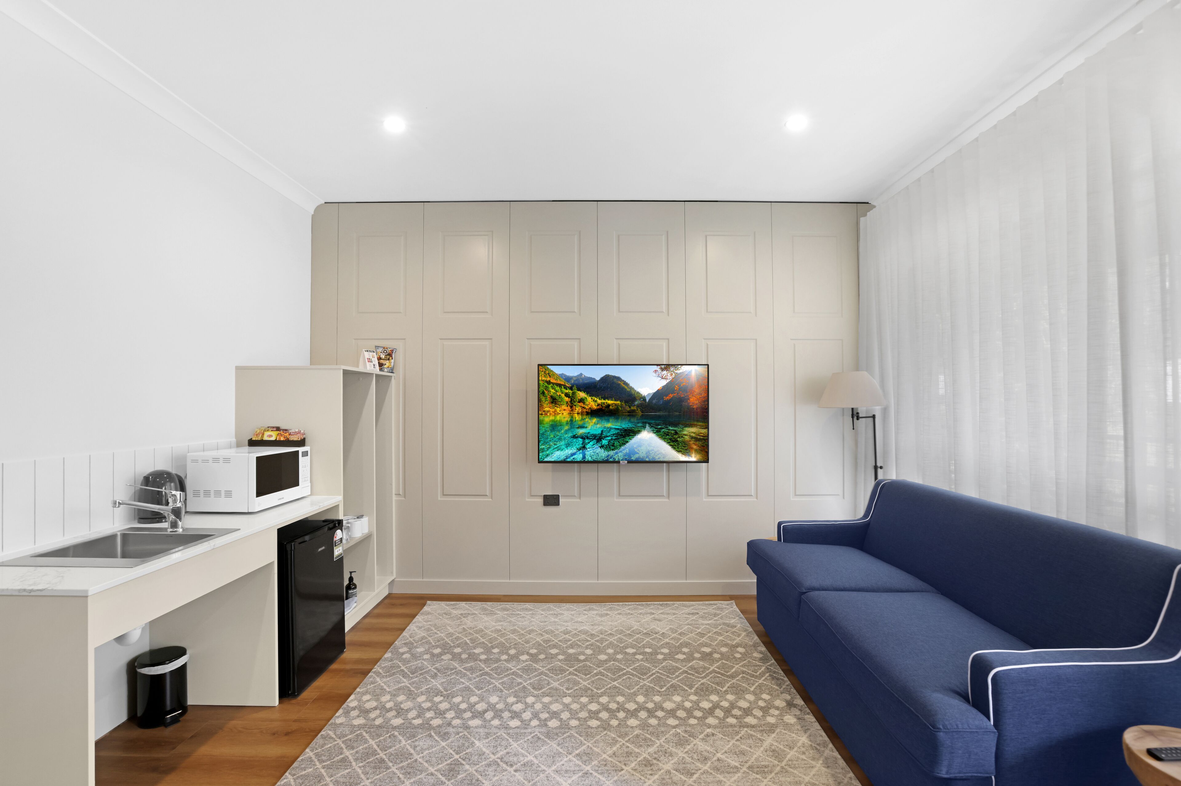 accessible york suite | living area | 50-inch flat-screen tv with digital channels, tv