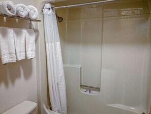 Combined shower/tub, hair dryer, towels, soap