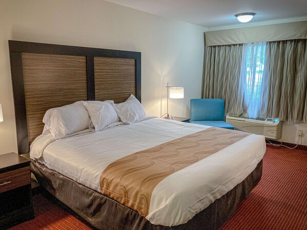 Desk, laptop workspace, blackout curtains, free WiFi