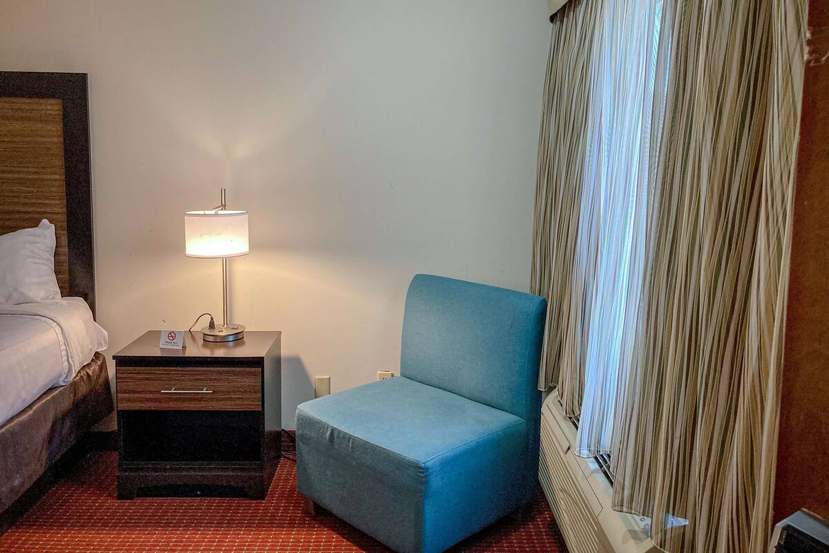 Desk, laptop workspace, blackout curtains, free WiFi