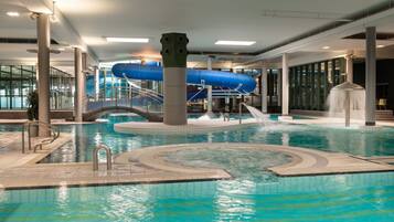 Enjoy a refreshing swim in the large central pool or relax in the circular hot tub area.