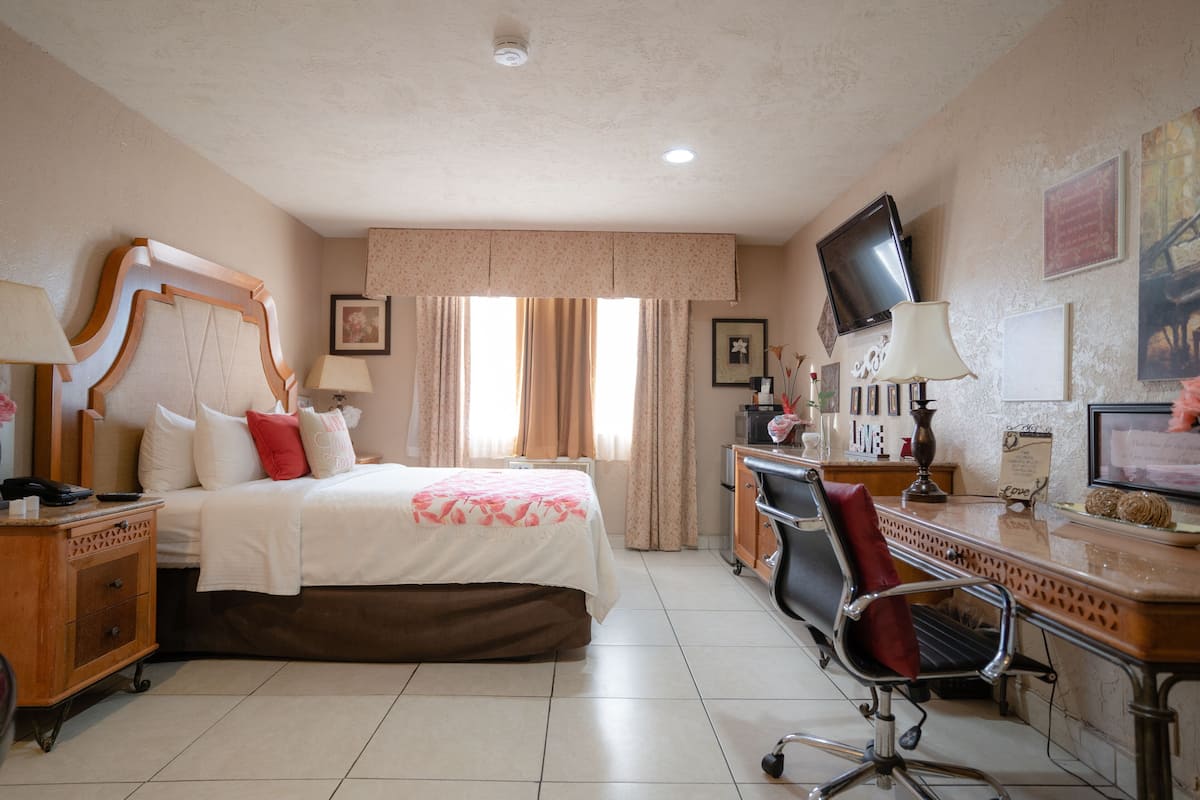 1 bedroom, individually decorated, blackout curtains, iron/ironing board