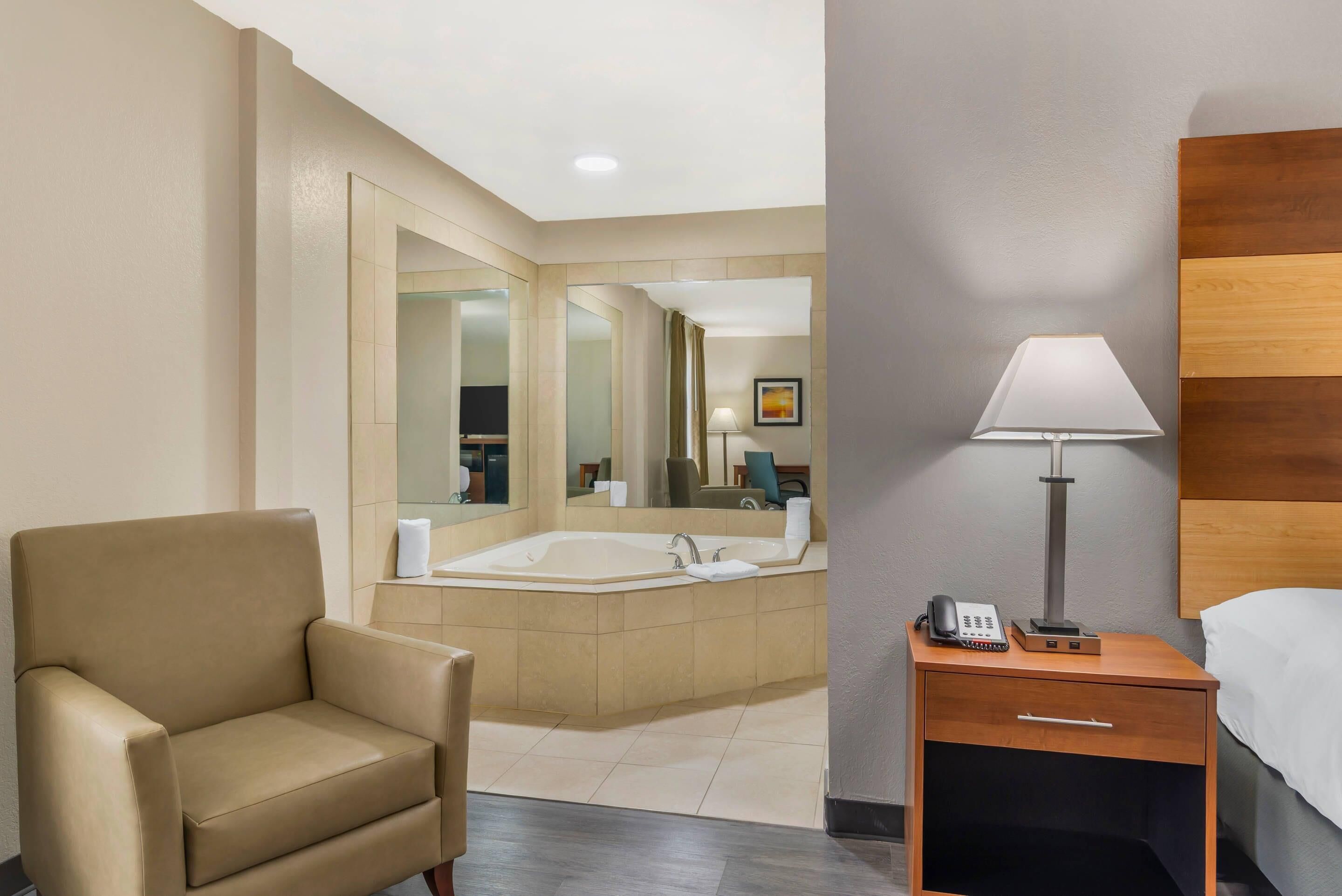 Room, 1 King Bed, Non Smoking (Upgrade) | Desk, iron/ironing board, free cribs/infant beds, rollaway beds