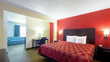 Colchones con acolchado adicional y tabla de planchar con plancha