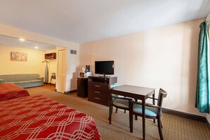 Suite, Multiple Beds, Non Smoking | Pillowtop beds, iron/ironing board, free WiFi, bed sheets