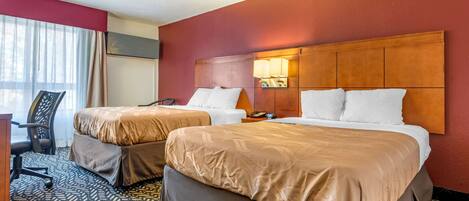 Premium bedding, pillowtop beds, desk, laptop workspace