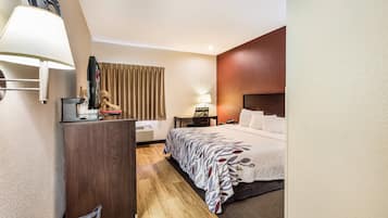 Deluxe Room, 1 King Bed (Smoke Free) | Desk, laptop workspace, blackout curtains, iron/ironing board