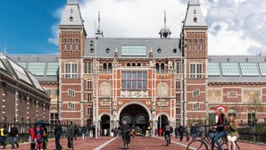 A historic building with large arched entrances and a central clock tower. - ibis Amsterdam Centre Stopera (Amsterdam)