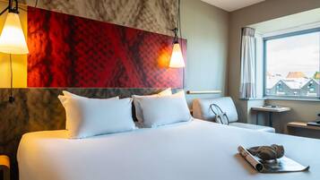 Hypoallergeen beddengoed, een kluis op de kamer, een bureau