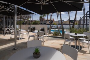 Outdoor pool, open 7:00 AM to 9:00 PM, sun loungers