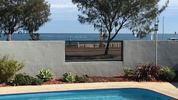 Outdoor pool, pool umbrellas, pool loungers