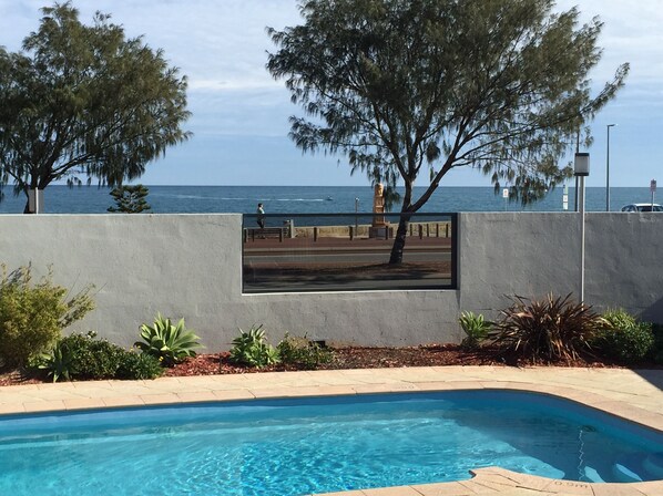 Outdoor pool, pool umbrellas, sun loungers