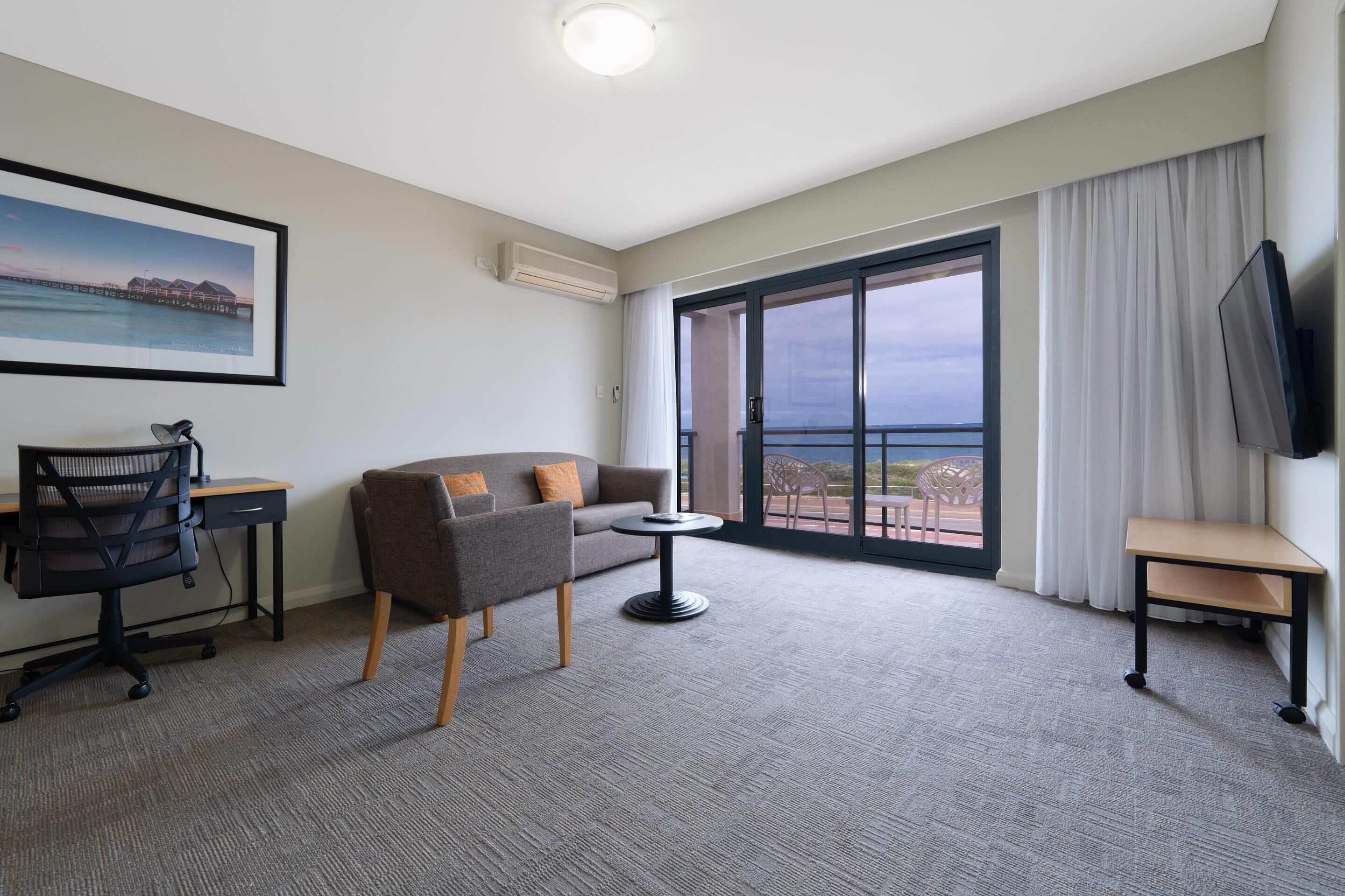 1 bedroom spa apartment ocean view | in-room safe, desk, blackout curtains, iron/ironing board