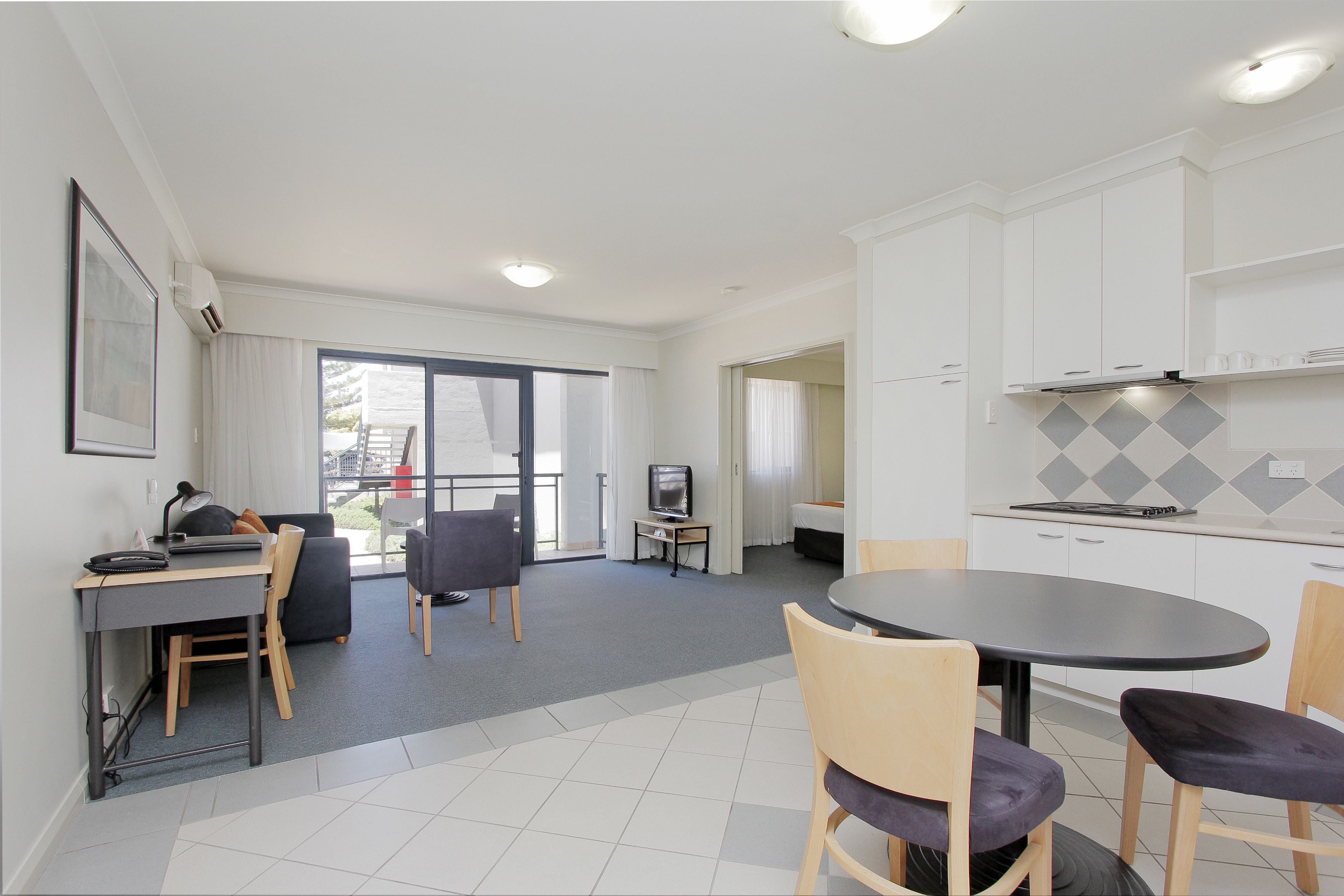 1 bedroom spa apartment resort view | in-room safe, desk, blackout curtains, iron/ironing board