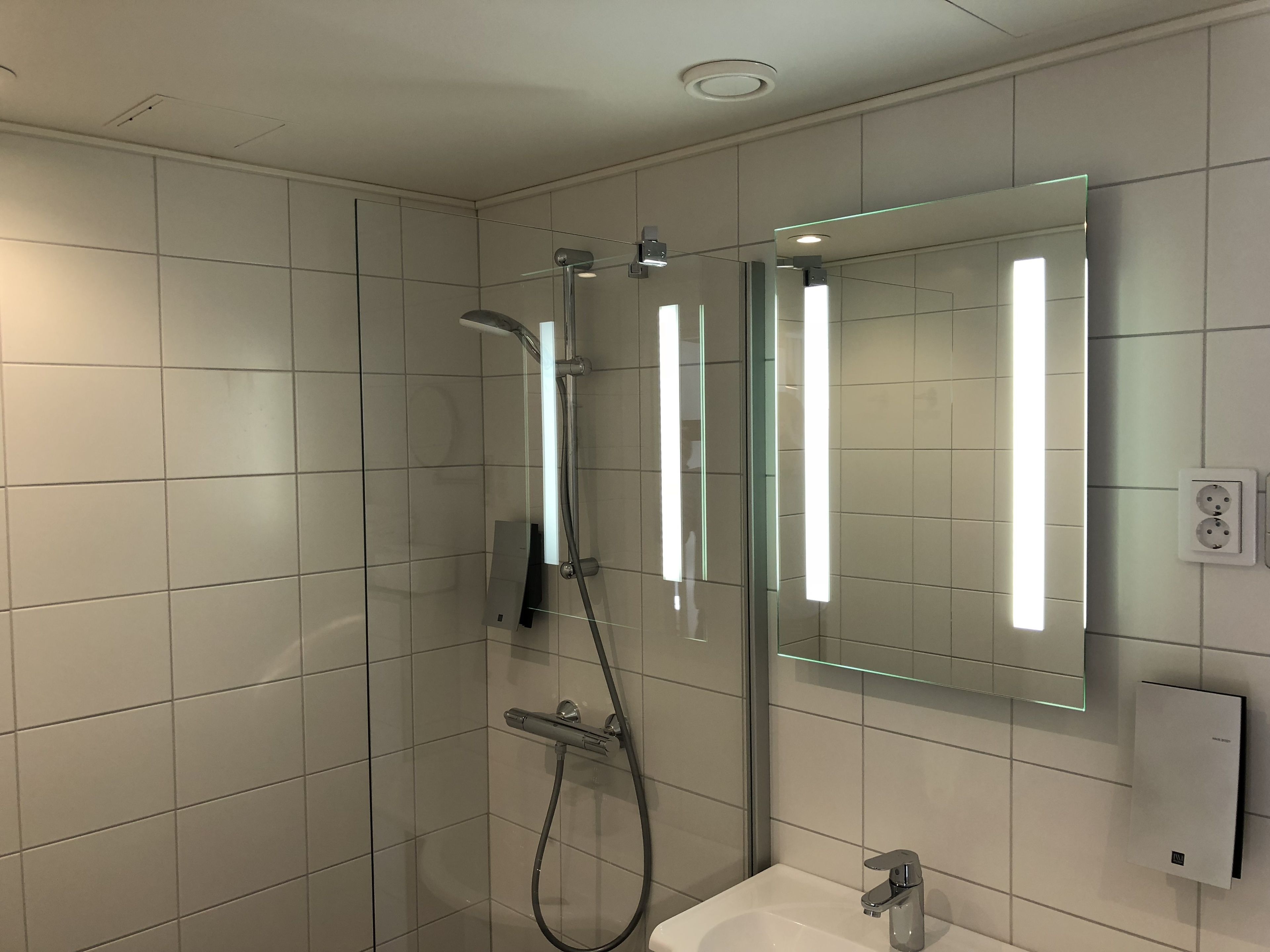 hypo-allergenic bedding, desk, laptop workspace, blackout curtains