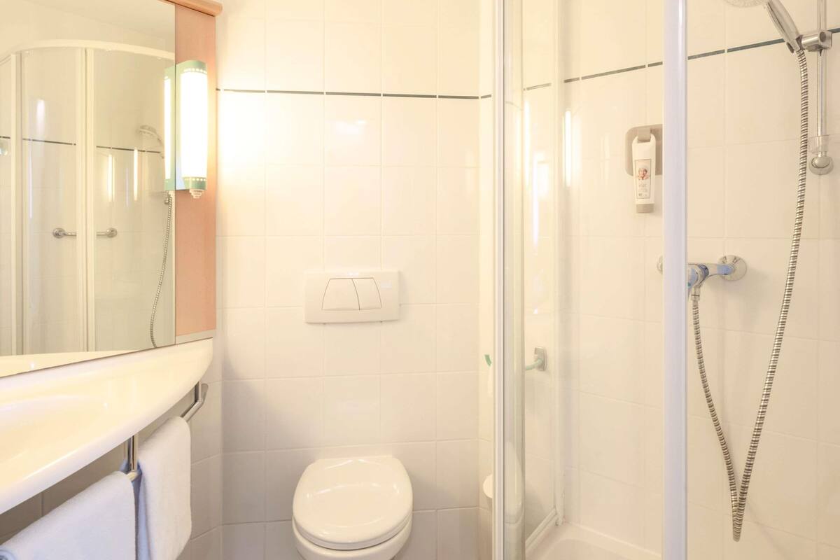 Luxe beddengoed, een kluis op de kamer, geluiddichte muren