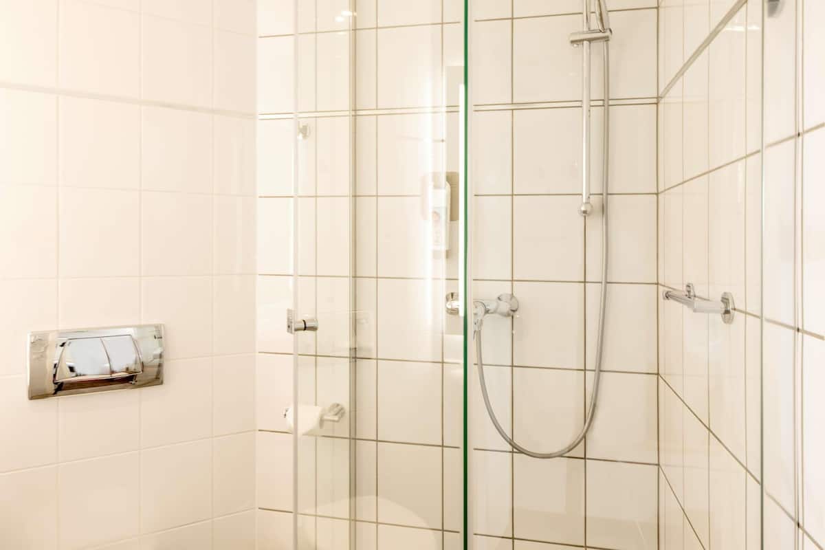 Roba de llit d'alta qualitat i caixa forta a l'habitació