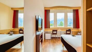 Comfort Room, 1 Double Bed (Pilatus view) | Minibar, desk, blackout drapes, soundproofing