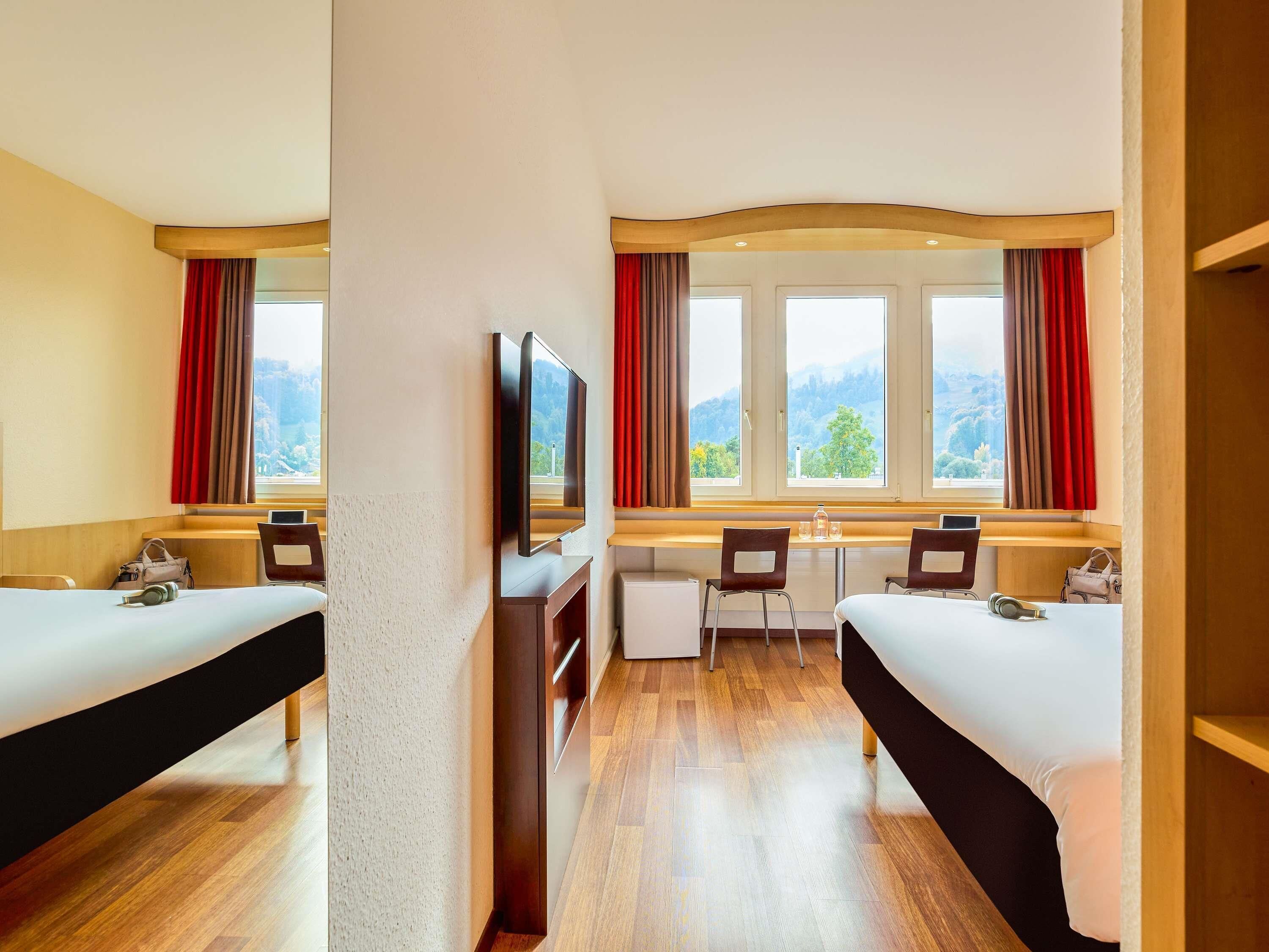 Comfort Room, 1 Double Bed (Pilatus view) | Minibar, desk, blackout drapes, soundproofing