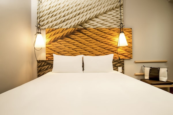 Blackout drapes, WiFi (free), alarm clocks, bed sheets