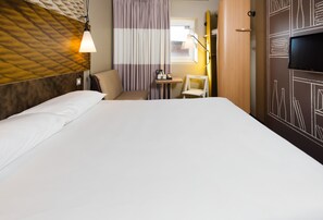 Familiekamer, meerdere bedden | Verduisterende gordijnen, gratis wifi, beddengoed, een wekker