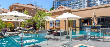 Outdoor pool, pool umbrellas, sun loungers