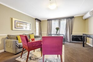 Standard Apartment, 2 Queen Beds | In-room safe, desk, laptop workspace, iron/ironing board