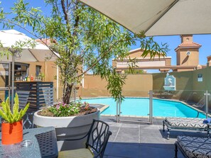 Outdoor pool, pool umbrellas, pool loungers