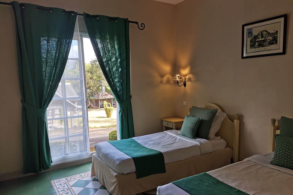 Twin Room | Minibar, in-room safe, desk, rollaway beds