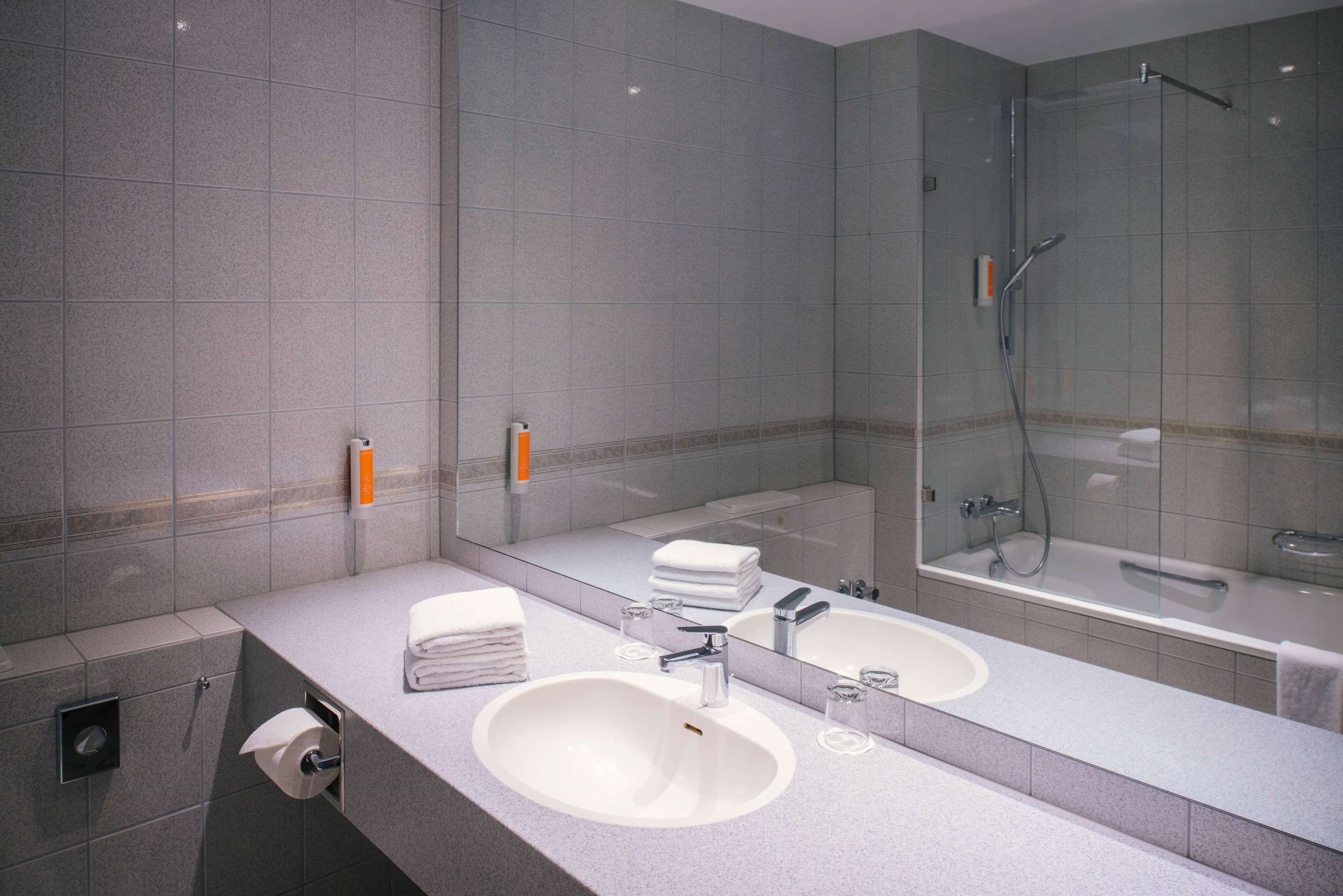 comfort room (plus) | bathroom | combined shower/bathtub, hair dryer, towels