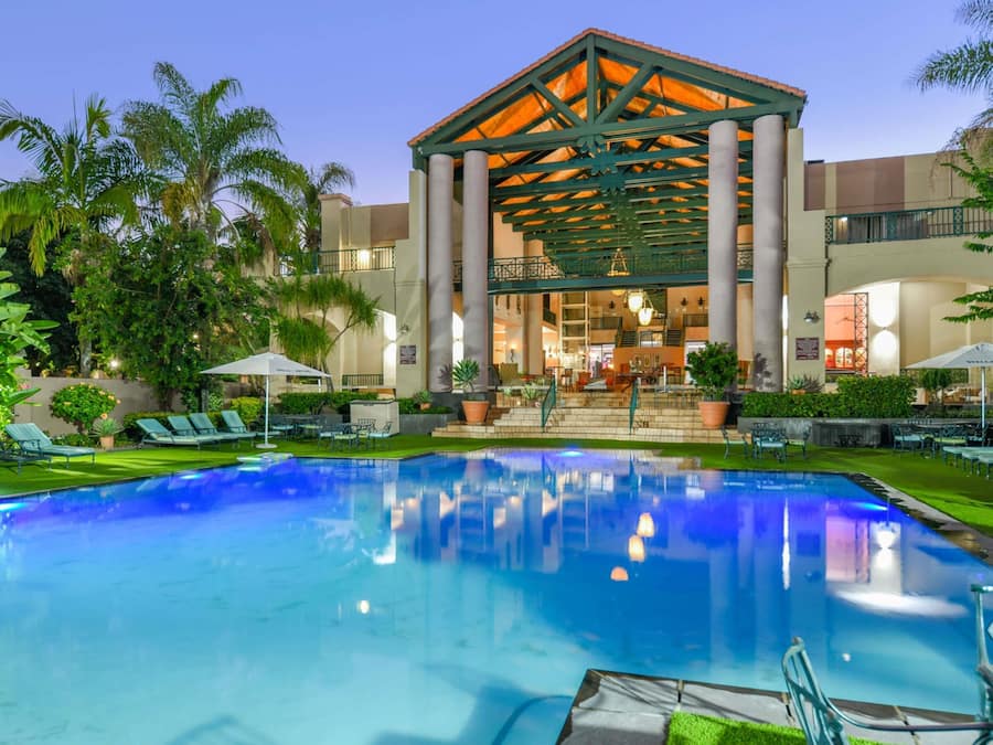 Outdoor pool, pool umbrellas, sun loungers