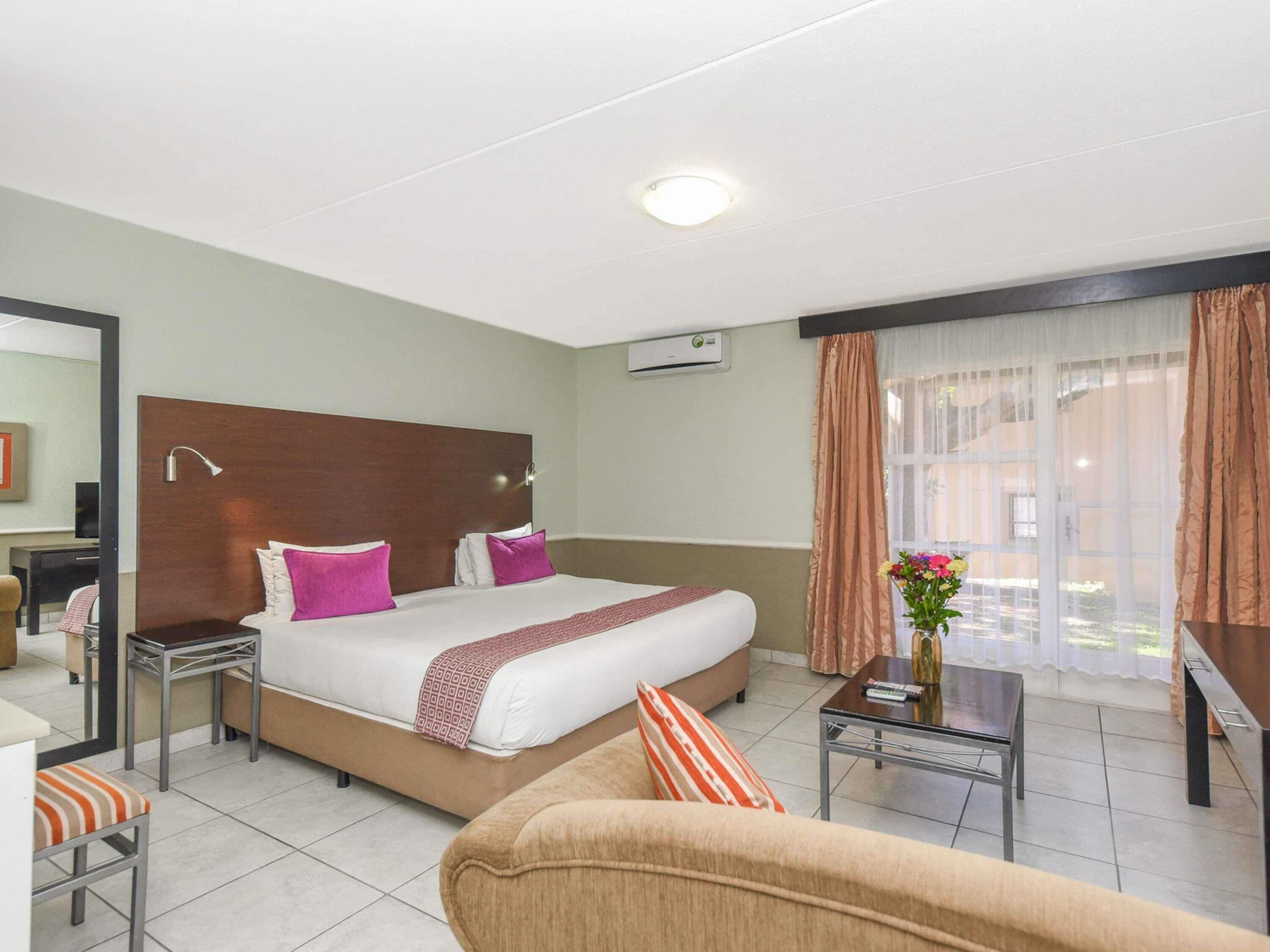 Deluxe Double Room, 1 Double Bed | In-room safe, desk, blackout drapes, iron/ironing board