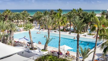 Indoor pool, outdoor pool, free pool cabanas, pool umbrellas