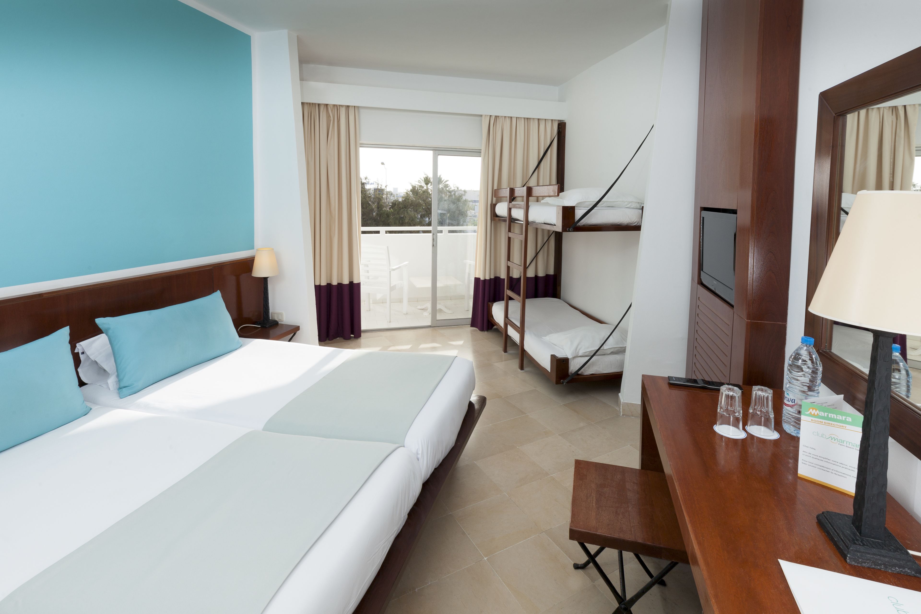 quadruple room | select comfort beds, minibar, in-room safe, desk