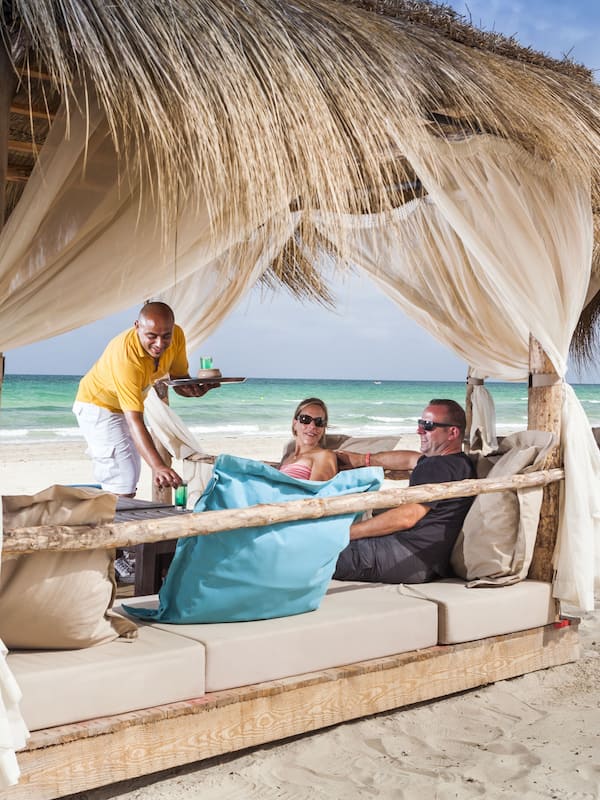 On the beach, sun loungers, beach umbrellas, beach towels