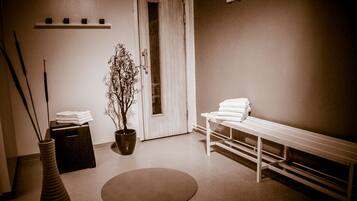 Experience a serene retreat with a neatly arranged bench, potted plant, and plush rug.